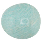 A polished oval cabochon amazonite gemstone of light aqua blue with white marbling, shown on a solid white background.