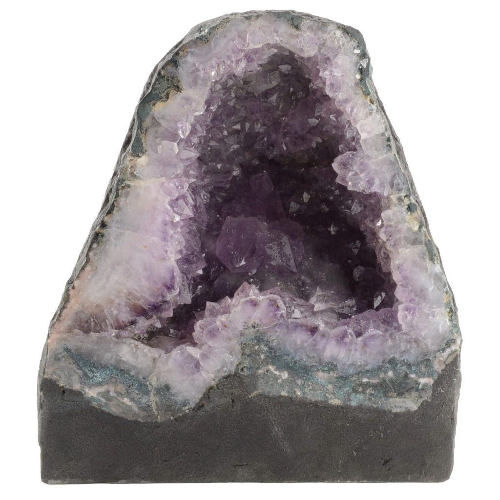 A raw amethyst geode specimen with a dark gray base, featuring light purple and white crystalline outer walls and a deep purple interior, shown on a plain white background.