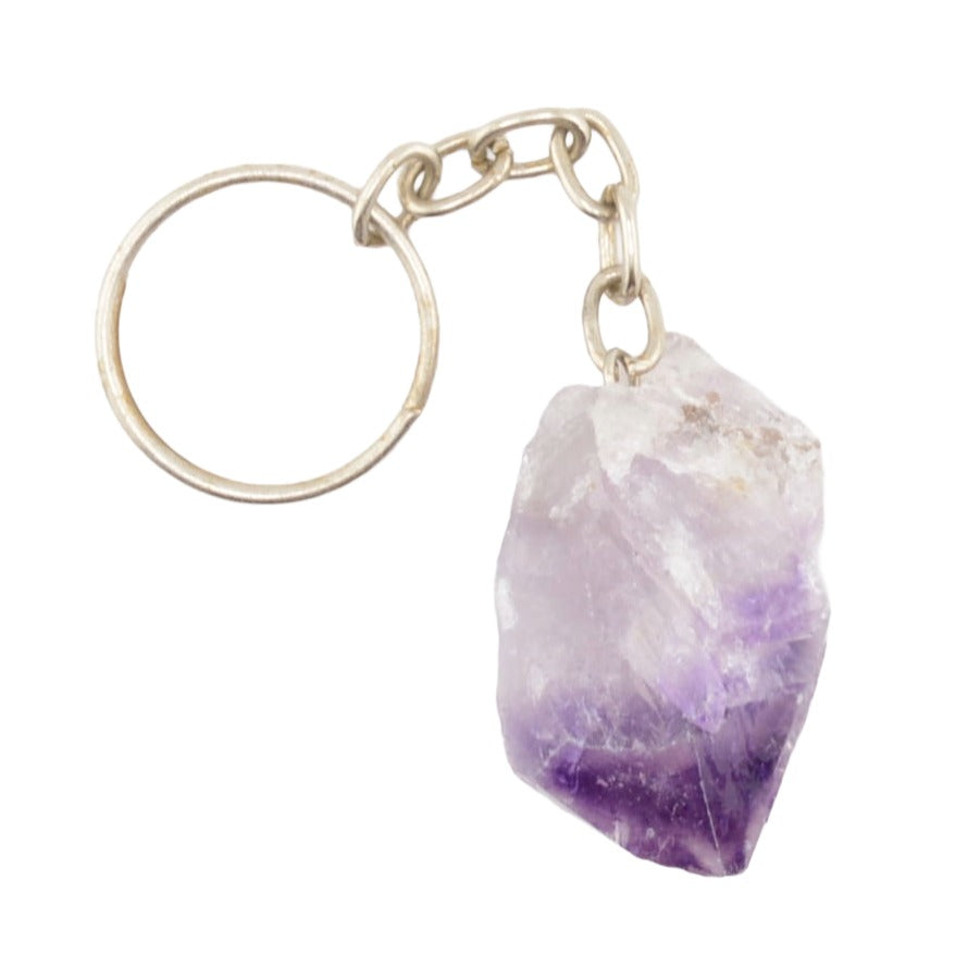 A raw amethyst crystal keychain featuring a natural purple and white gradient stone pendant attached to a silver-tone metal split ring and chain, shown on a plain white background.