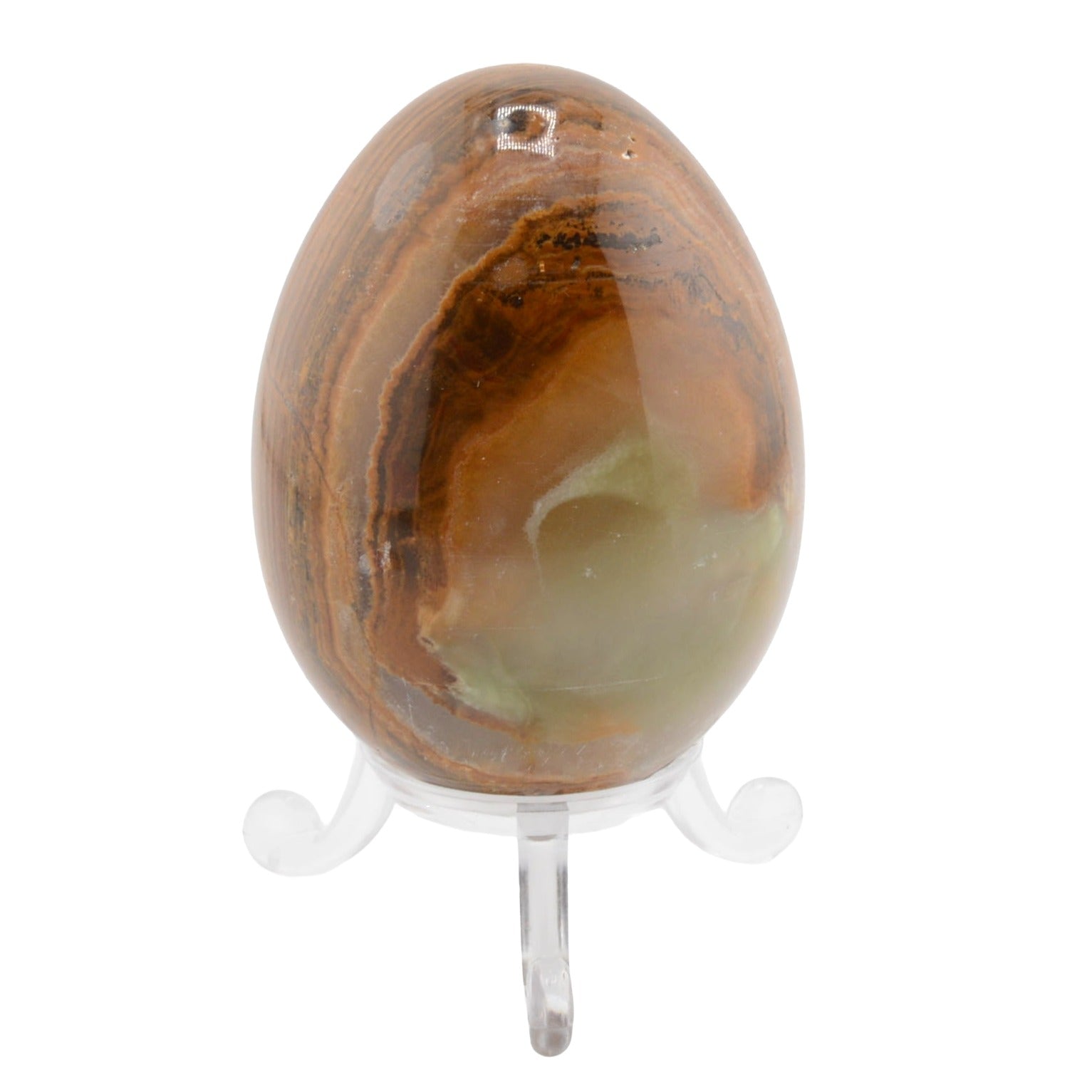A polished brown and amber banded calcite egg with natural banding, displayed on a clear acrylic stand against a white background.