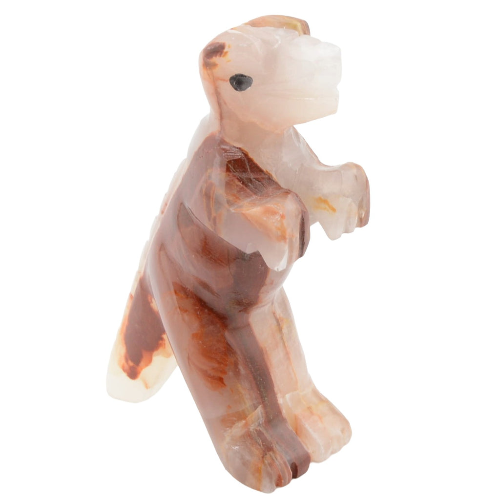 A carved stone figurine of a dinosaur,  made from banded calcite or onyx with natural brown and cream marbling, set against a plain white background.
