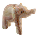 A carved elephant figurine made from banded calcite with natural brown, beige, and cream patterns, set against a plain white background.