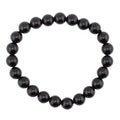 A beaded stretch bracelet made of glossy, polished black obsidian 8mm round beads, arranged in a circular shape against a solid white background.