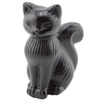 A glossy black obsidian cat figurine with a ribbed texture, shown against a plain white background.
