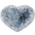 A heart-shaped decorative celestite geode sculpture, shown on a plain white background.