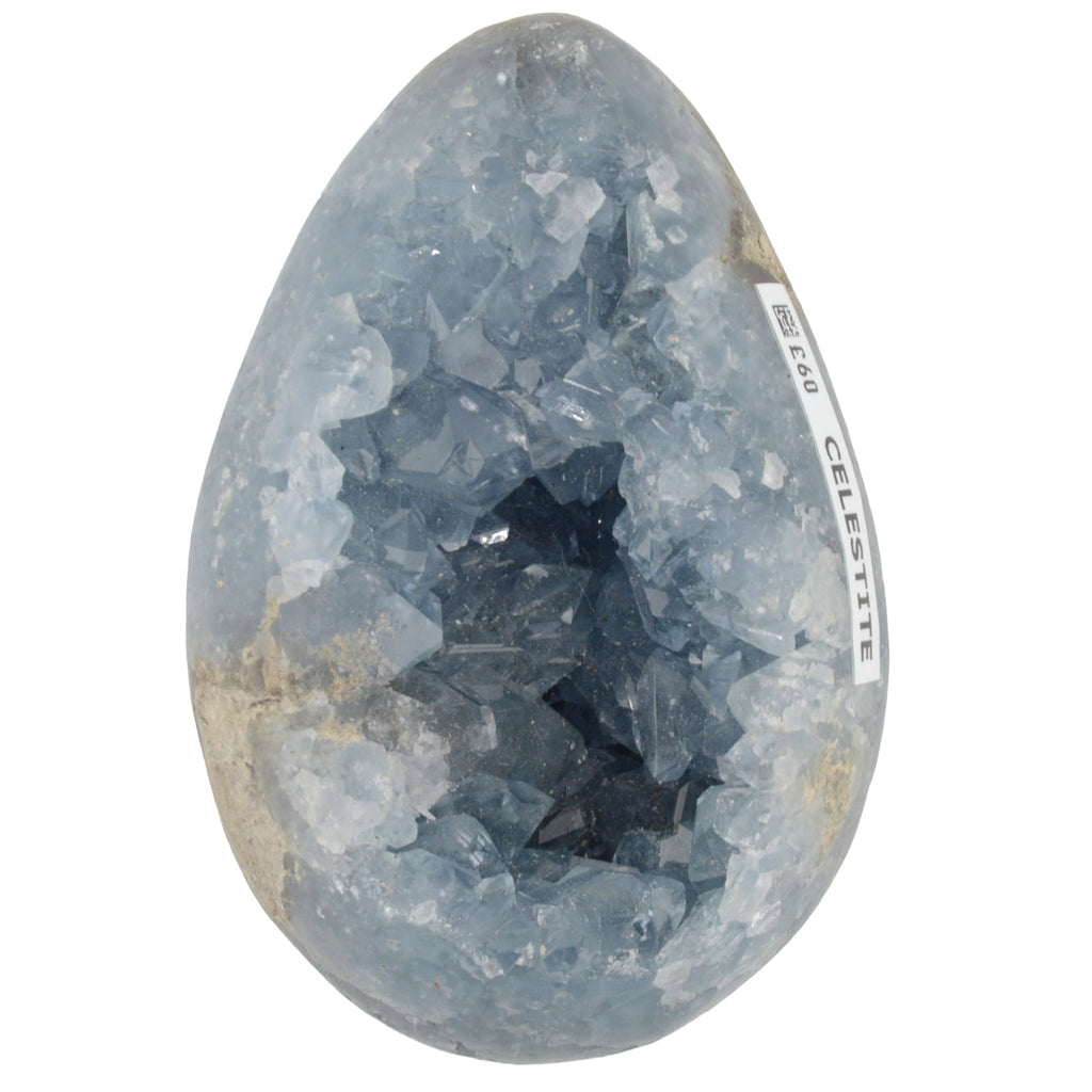 A Blue Celestite Grystal Geode Egg displayed against a plain white background.