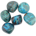 Six polished tumbled chrysocolla gemstones with a natural turquoise and green matrix pattern, arranged on a plain white background.