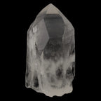 A natural clear quartz point crystal with internal inclusions, shown against a solid black background.