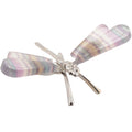 A dragonfly-shaped carving featuring candy fluorite striped wings in pastel pink, purple, blue, and green, mounted on a polished silver-tone metal body.