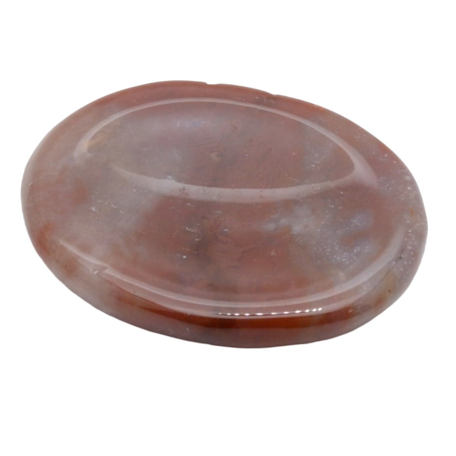 A polished oval-shaped reddish-brown fancy jasper worry stone with natural marbling and a smooth, glossy finish, isolated on a white background.