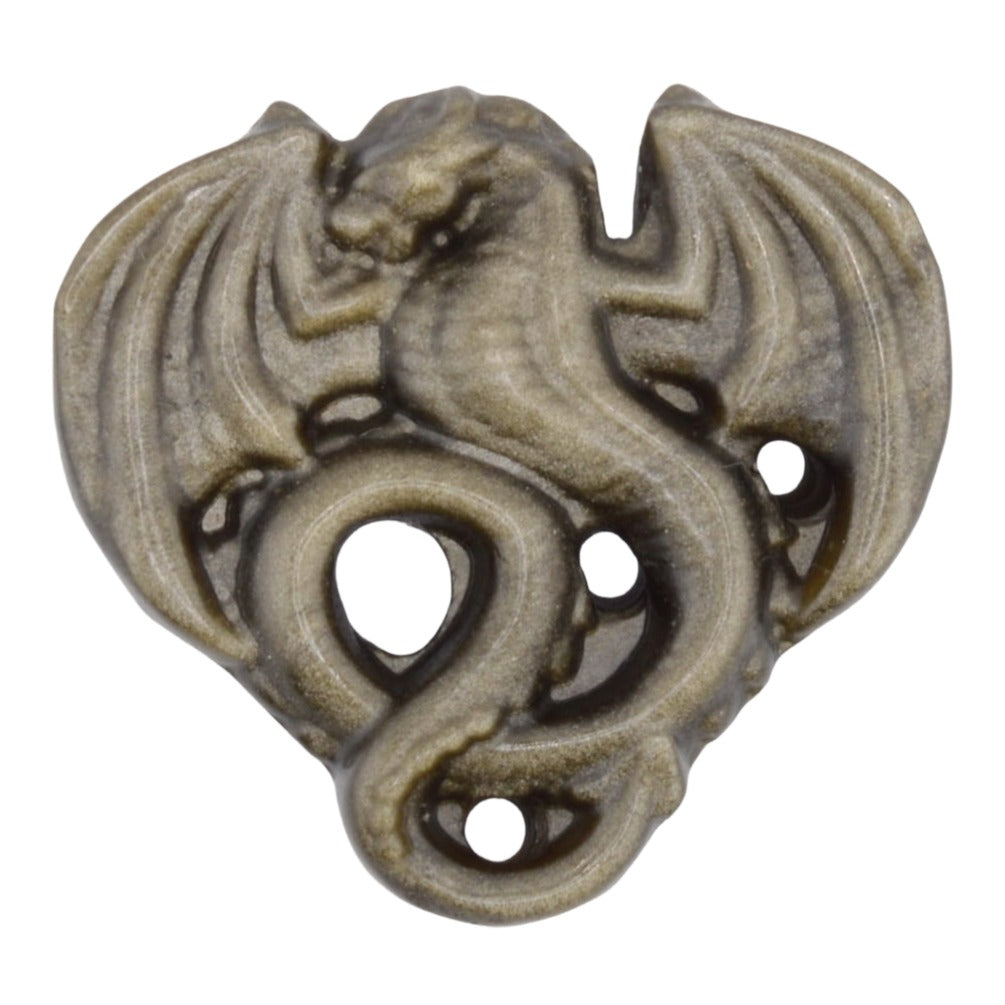 A sgolden sheen obsidian carving shaped like a stylized dragon or winged creature with fourcircular holes, shown on a plain white background.