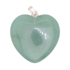 A heart-shaped light green aventurine gemstone pendant with a silver bail, shown on a plain white background.