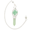 A green aventurine gemstone point & merkaba pendulum, featuring a silver chain with ball, set in a silver bezel on a white background.