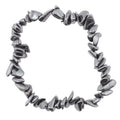 A metallic hematite silver stretch bracelet made of irregular, polished chip-style beads, shown on a plain white background.