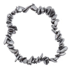 A metallic hematite silver stretch bracelet made of irregular, polished chip-style beads, shown on a plain white background.