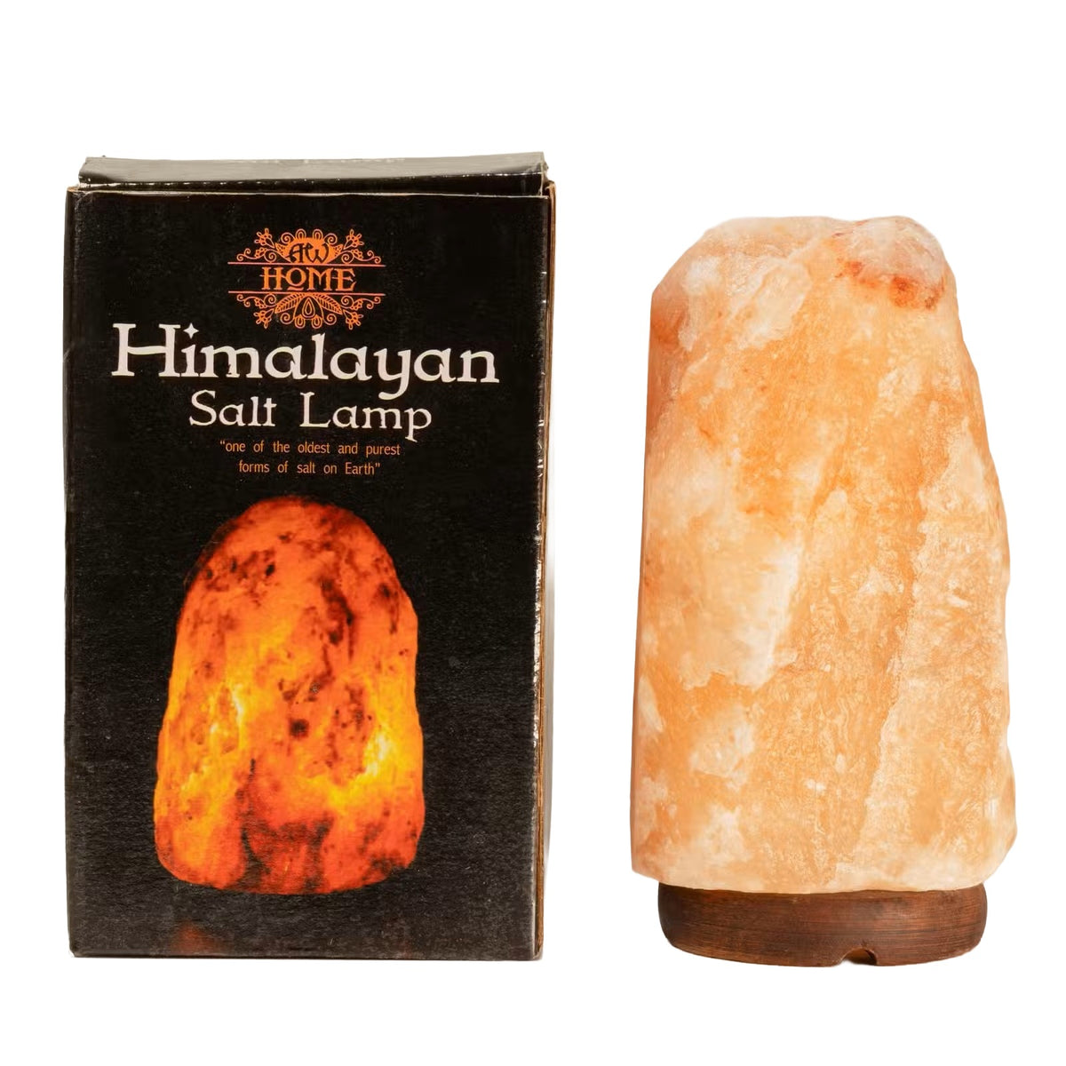 A Himalayan salt lamp made of natural pink salt on a dark wooden base, shown next to its black retail packaging box with a picture of the glowing lamp.