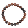A beaded stretch bracelet made of mahogany obsidian alternating glossy round beads in reddish-brown and black with natural marbled patterns, displayed on a clean white background.