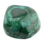 A polished tumbled stone of malachite featuring natural green and turquoise bands with dark veins, set against a plain white background.