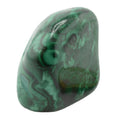 A polished green malachite stone with natural swirling patterns, shown on a plain white background.