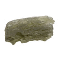 A raw, rough moldavite tektite, translucent olive-green color, isolated on a solid white background.