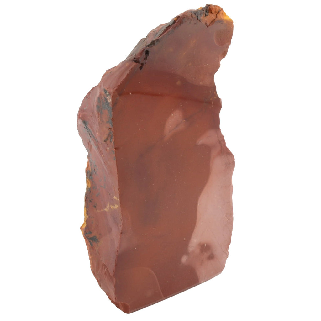 A raw, rough-cut piece of mookaite gemstone with natural inclusions and a chipped, unfinished edge, isolated on a white background.