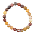 A beaded stretch bracelet made of mookaite 8mm polished round gemstone beads in assorted earthy colors including brown, red, orange, yellow, and cream, arranged in a circle on a plain white background.