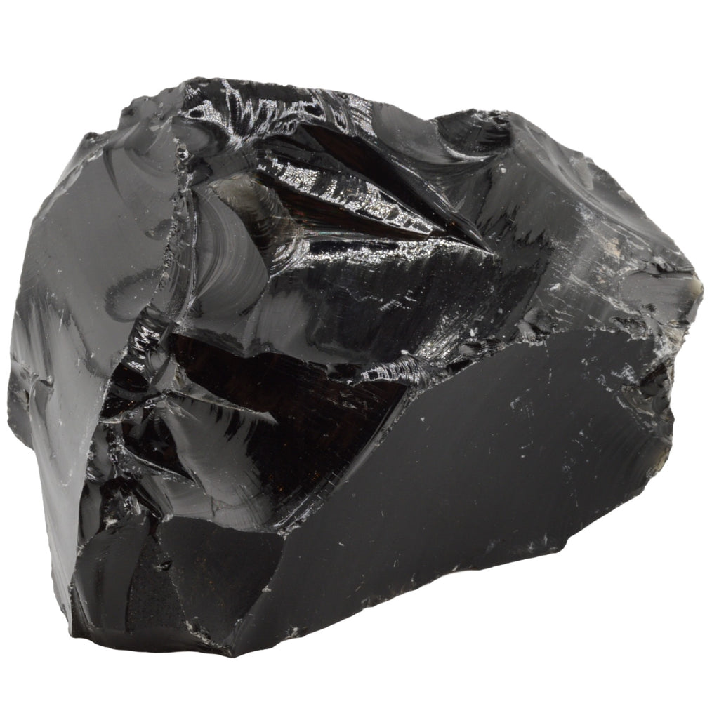 A rough, unpolished black obsidian stone with sharp, jagged edges and a glossy, reflective surface, isolated on a solid white background.