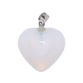 A heart-shaped pendant made of milky white opalite with a silver bail, shown against a plain white background.