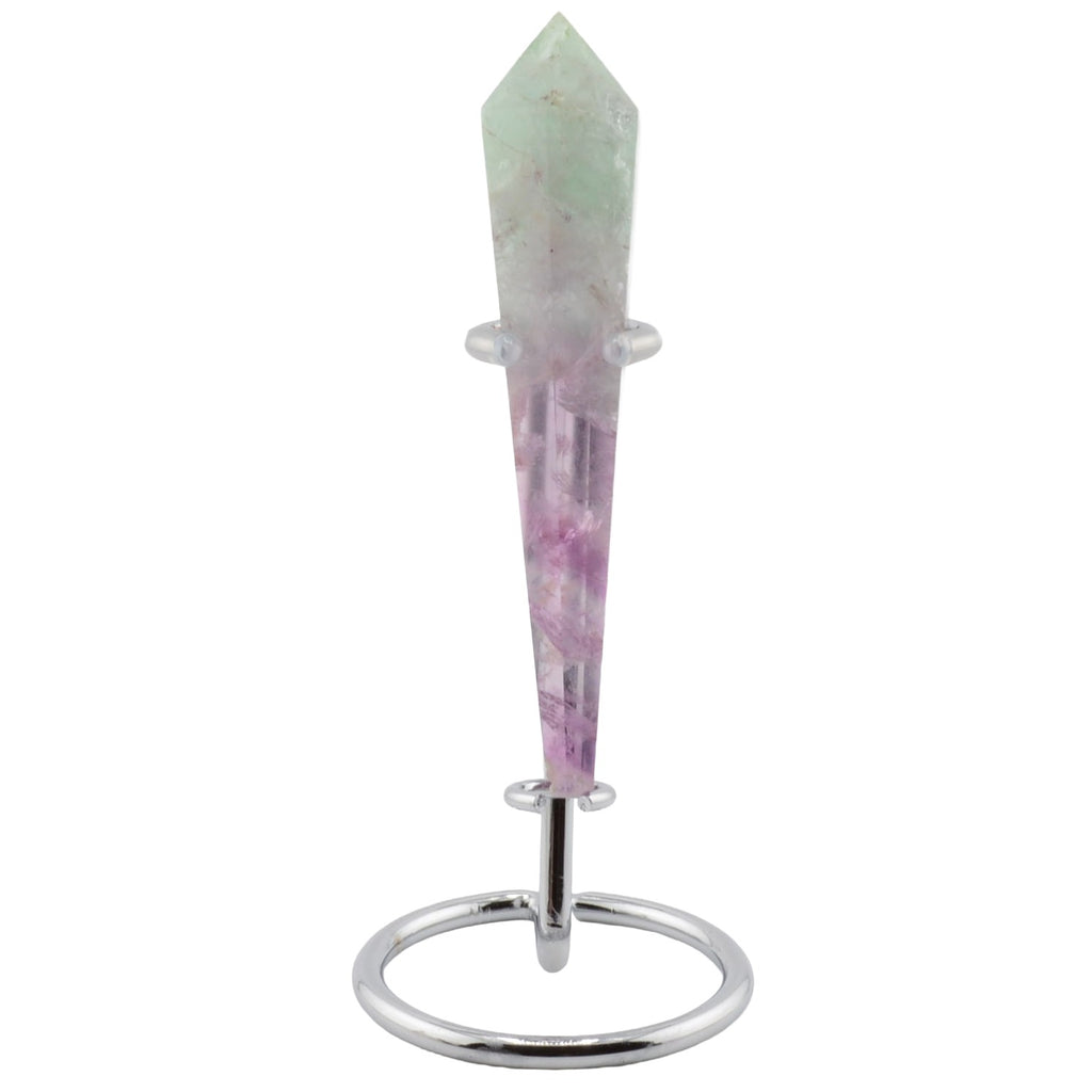 A pointed fluorite crystal tower on a silver metal stand, featuring a dual-toned stone that transitions from pale green at the top to light purple at the bottom, set against a plain white background.