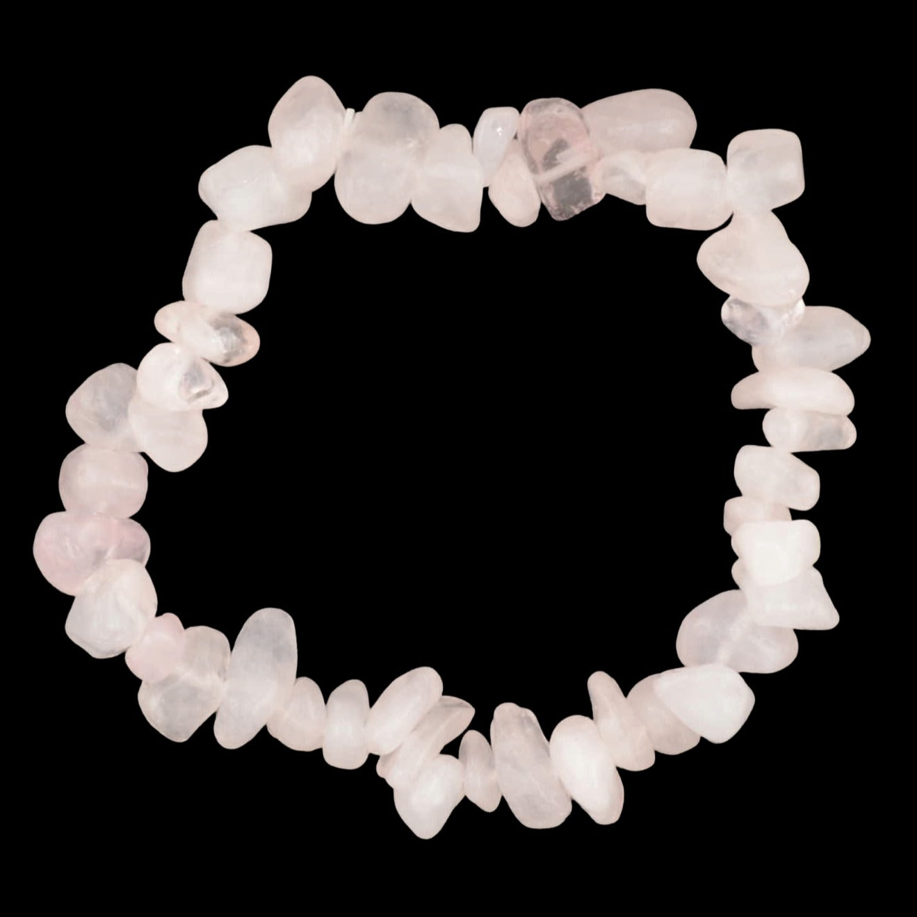 A circular bracelet made of small, irregular pink rose quartz crystal chips, photographed on a dark textured gray background.