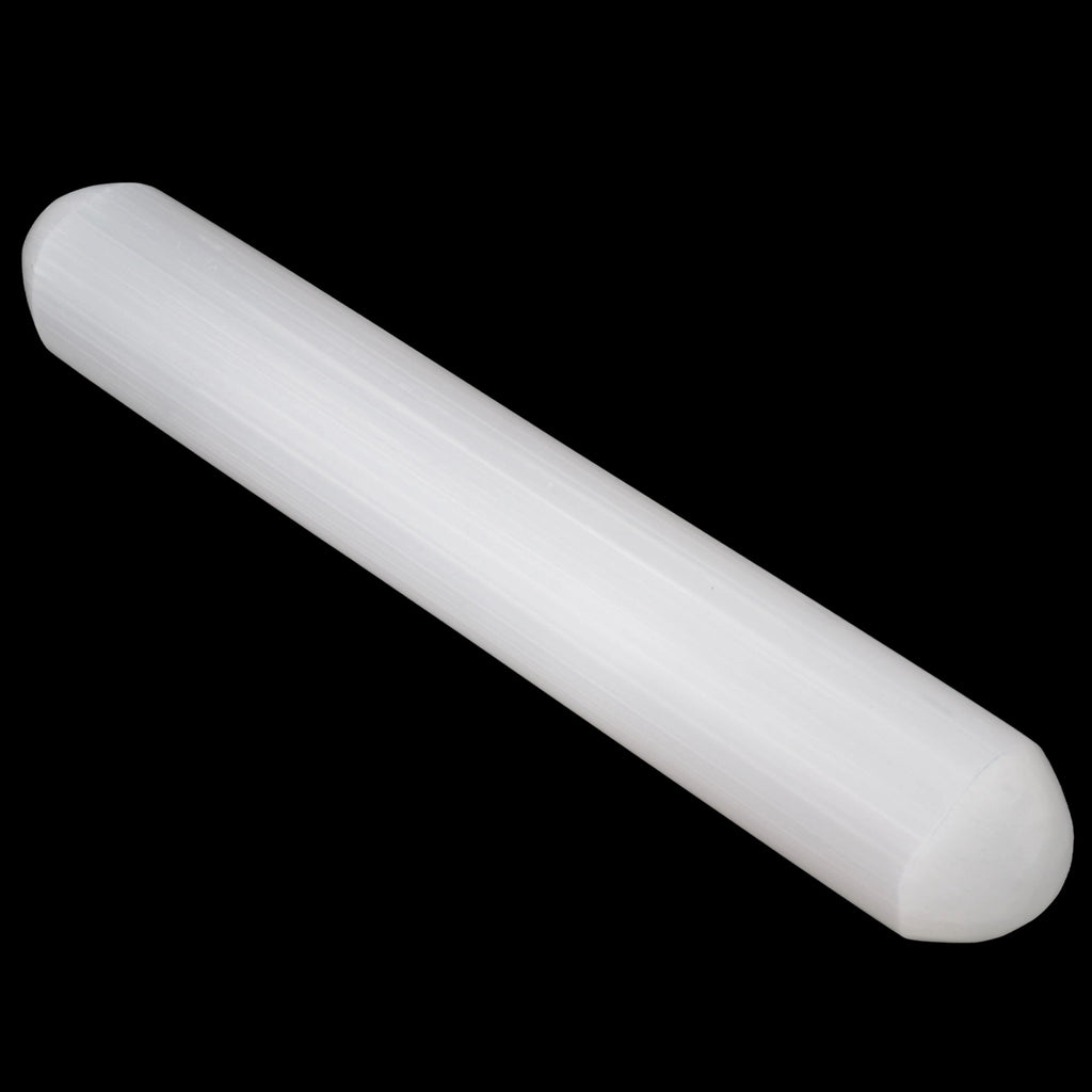 A translucent white cylindrical rod with rounded ends, made from selenite. Shown diagonally against a solid black background.