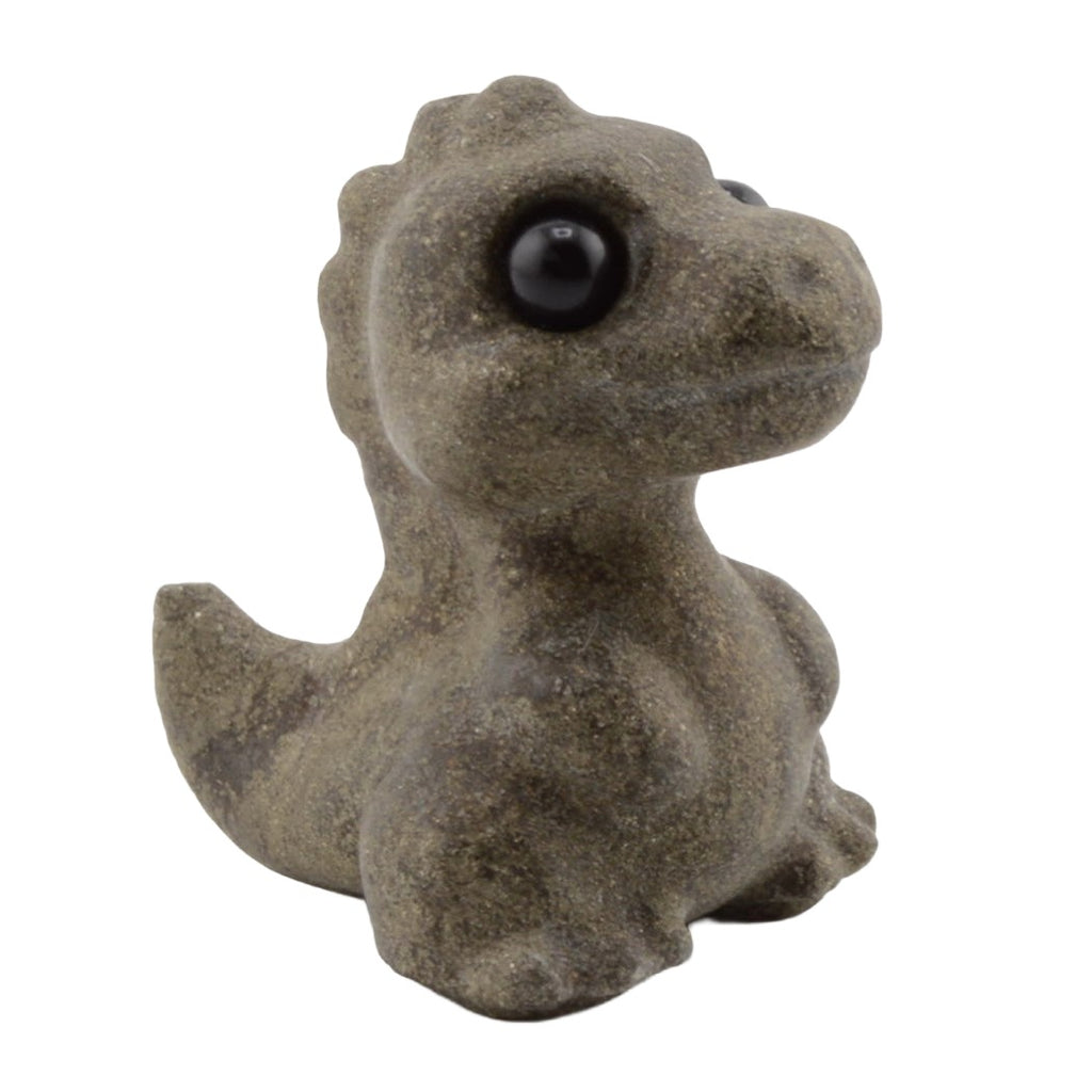 A small dinosaur T-Rex figurine made of gemstone , featuring a dark gray-brown body and glossy black eyes, isolated on a white background.